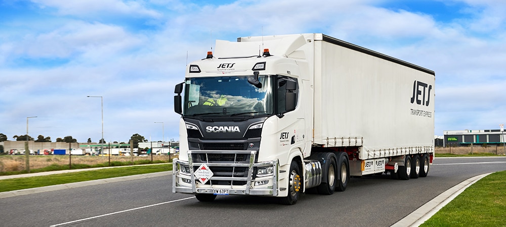 JETS Transport truck driving on the road